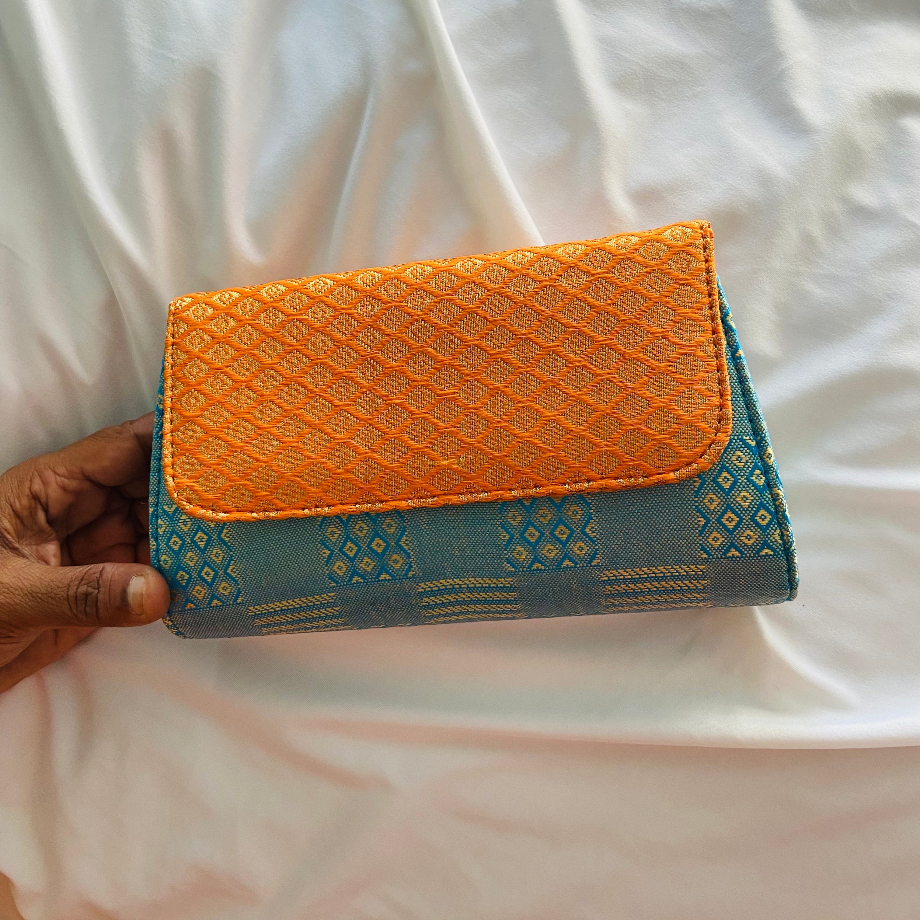 Buy Sunvika house Traditional Silk Pouch Light Weight Women's Clutch  Wedding Clutch Purse Handbag Party Bag Blue Color Online In India At  Discounted Prices