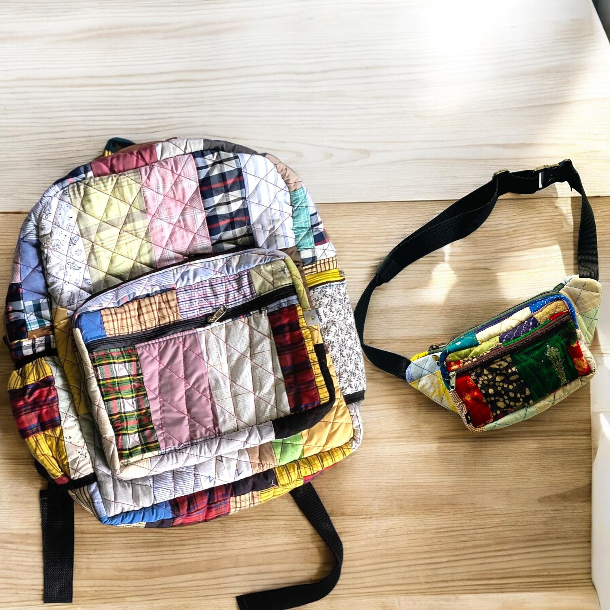 Upcycled patchwork backpack and fanny pack placed under sunlight on a clean wooden floor. The fanny pack features bright green and red blocks with Indian textile motifs, and a sturdy belt strap. Ideal as a festival, cycling, or walking companion. Sustainable and handmade, this versatile set offers a bold, stylish, and functional zero-waste alternative for everyday use.