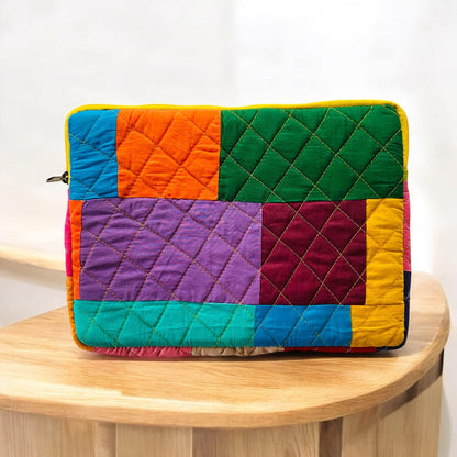laptop cover, case cover for macbook air, cover for hp laptop, laptop sleeves all sizes, cute laptop sleeves, quilted laptop cover, puffy laptop sleeve, laptop sleeve 13 inch macbook air, laptop sleeve, laptop sleeve custom size, laptop cover 15 inch, An eco-friendly laptop sleeve showcasing a mix of vibrant, multicolor solid patchwork fabric pieces, creating a bold and eye-catching design. The quilted, puffy construction ensures your laptop is well-protected.