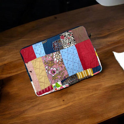 laptop cover, case cover for macbook air, cover for hp laptop, laptop sleeves all sizes, cute laptop sleeves, quilted laptop cover, puffy laptop sleeve, laptop sleeve 13 inch macbook air, laptop sleeve, laptop sleeve custom size, laptop cover 15 inch, An eco-friendly laptop sleeve showcasing a mix of vibrant, multicolor solid patchwork fabric pieces, creating a bold and eye-catching design. The quilted, puffy construction ensures your laptop is well-protected.