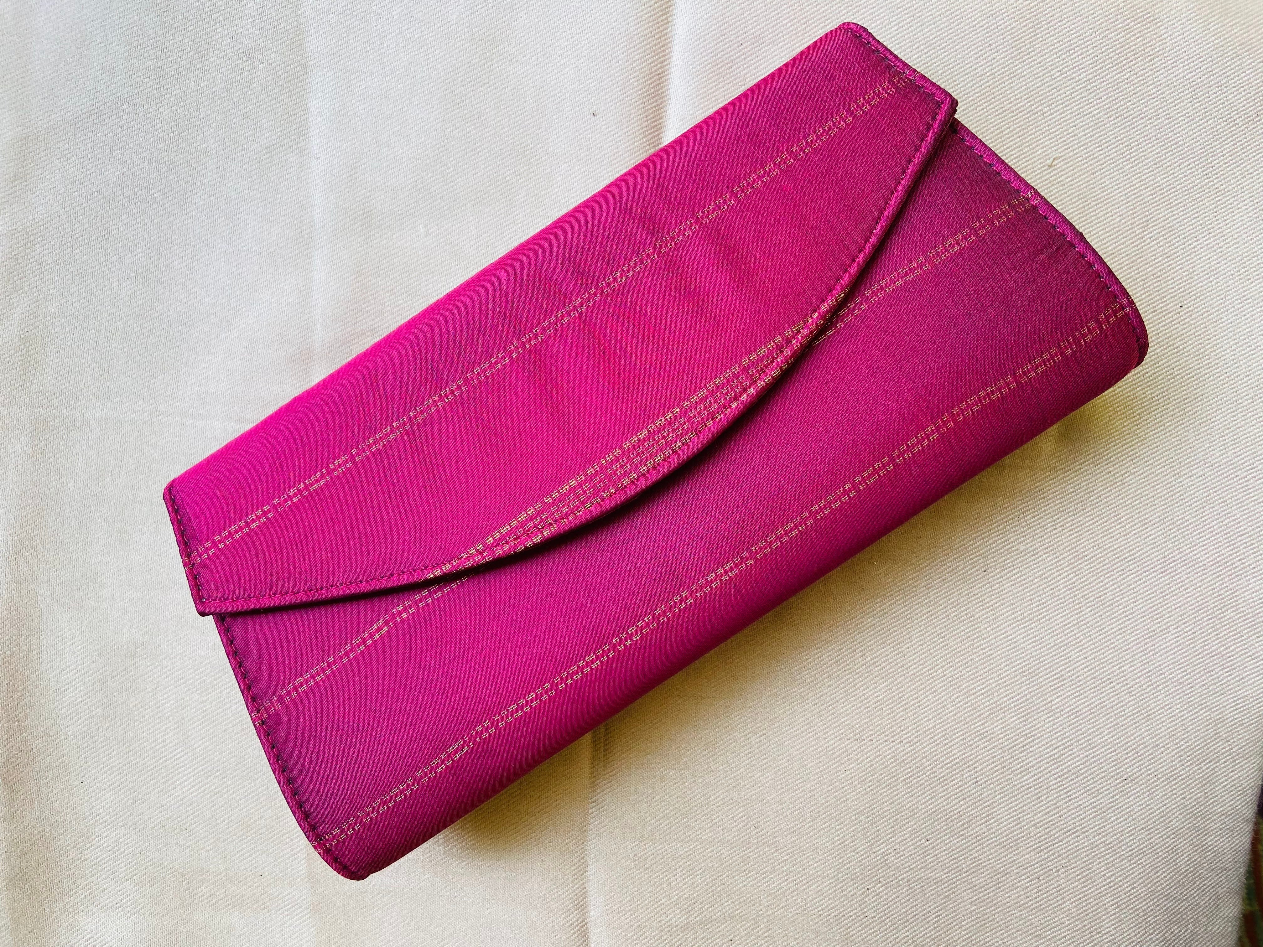 Pink Fendi First leather & shearling clutch bag | MATCHES x Sellier |  MATCHES UK